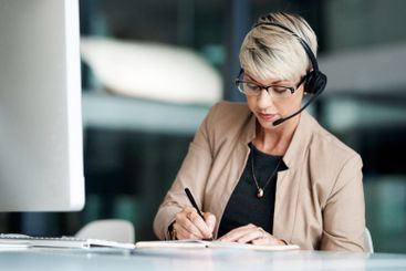 Call center, business and woman in office, writing notes...