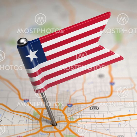Liberia Small Flag on a Map Background.