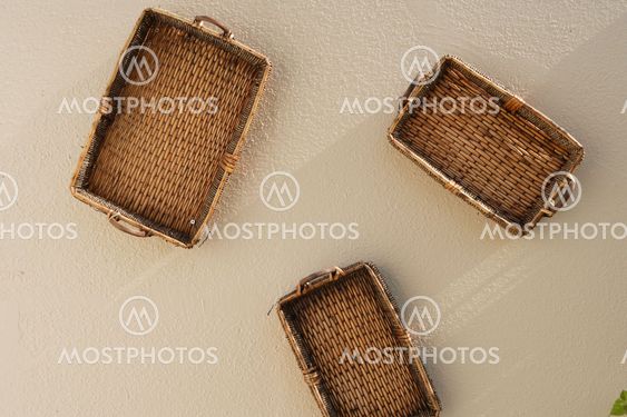 Three baskets hanging on the wall