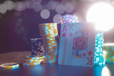 Poker game set of cards and chips close up