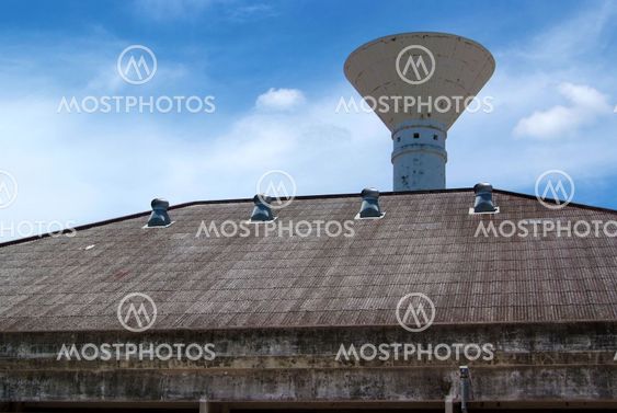 The air vent on the roof of the factory and Water Tower.