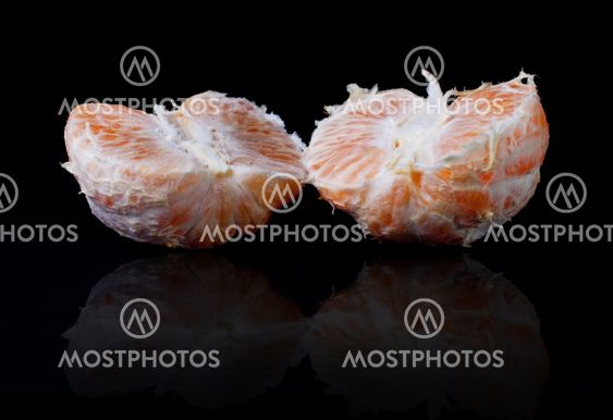 Halves of peeled tangerine