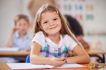 Education, portrait and writing with girl student in...