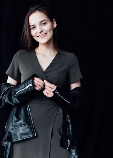 Beautiful fashionable woman in gray summer dress and...