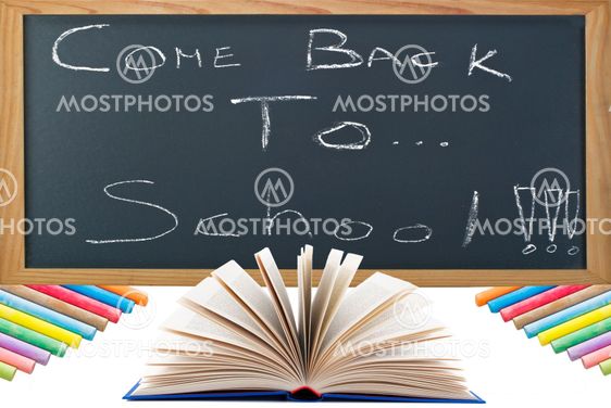 return to school concept with book and blackboard