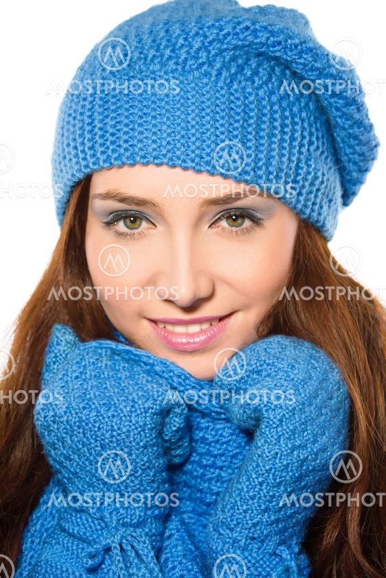 Young happy woman wearing winter cloth