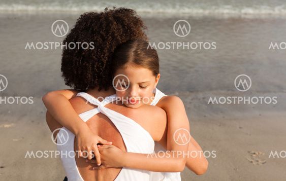 ortrait of a relaxed Daughter Hugging her mother