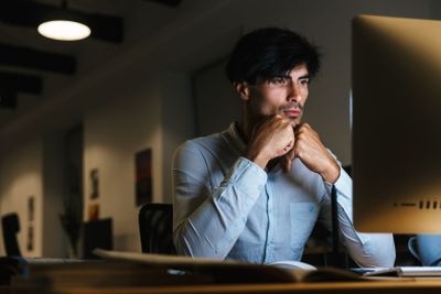 Portrait of a confident concentrated businessman working