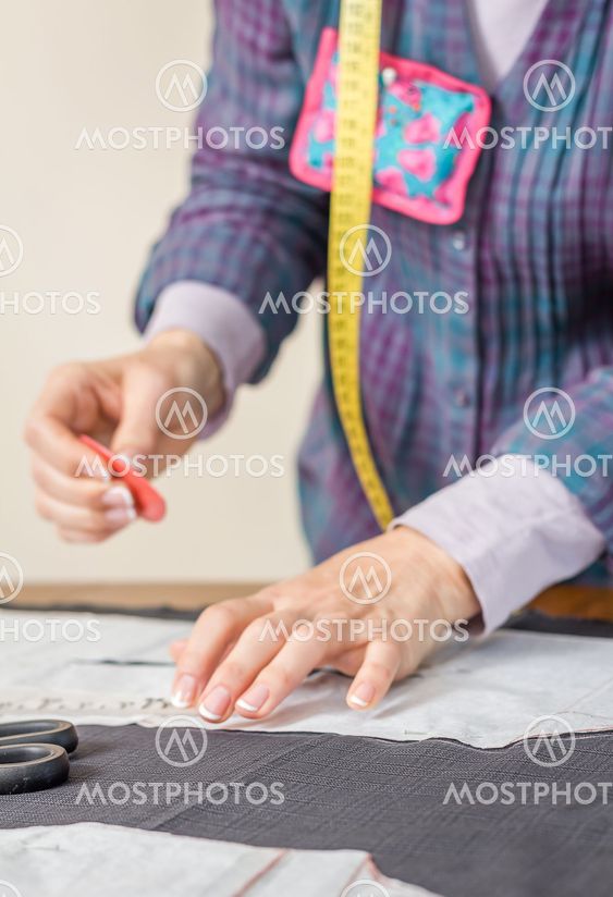 Dressmaker design tailor pattern on the table
