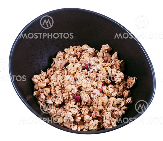 muesli with berries in black bowl
