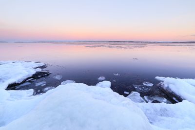 Lake scenery at dusk winter in Finland