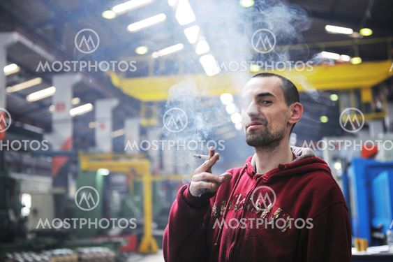 industry worker smoke cigarette
