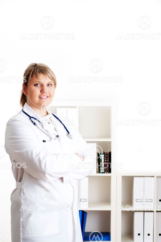 Smiling medical doctor woman with stethoscope.