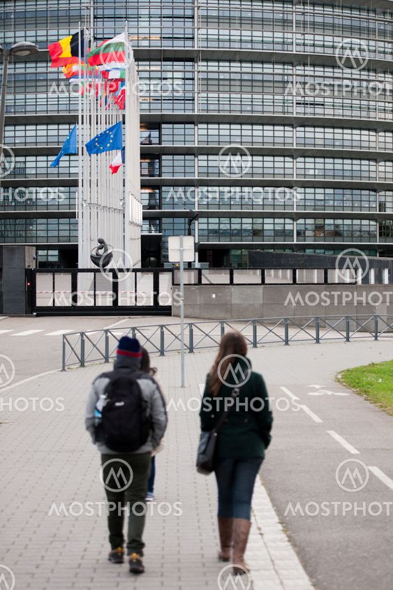 European Union Flags and France flag flies at half-mast