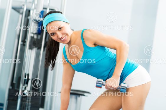 female athlete dumbbell