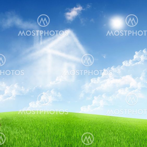 House from white clouds against blue sky