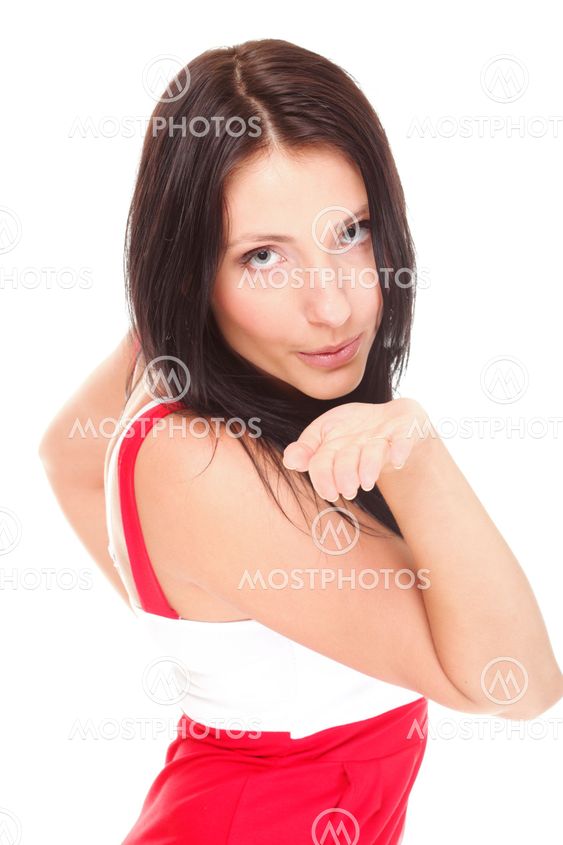 Beautiful cute brunette blowing you kiss isolated