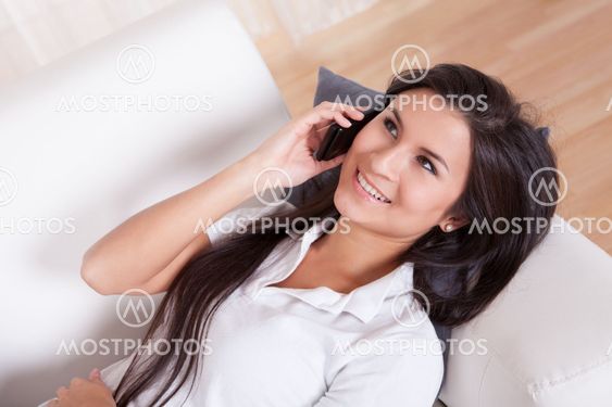 Attractive woman talking on her mobile