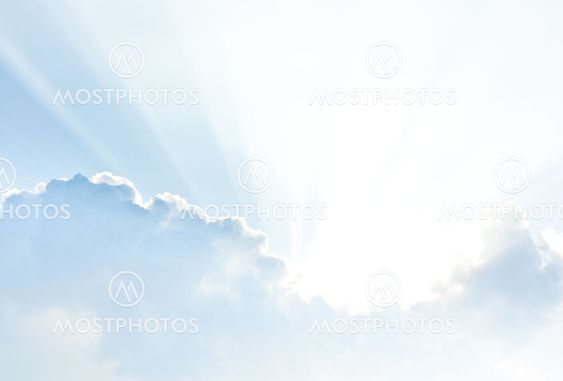 Blue sky with clouds and sunlight