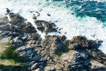 Rough and rocky shore at Malin Head, Ireland's...