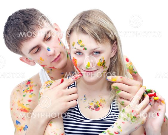 Closeup young woman and man drawing paints