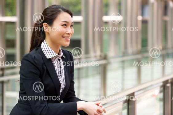 Portrait Of Chinese Businesswoman Outside Office