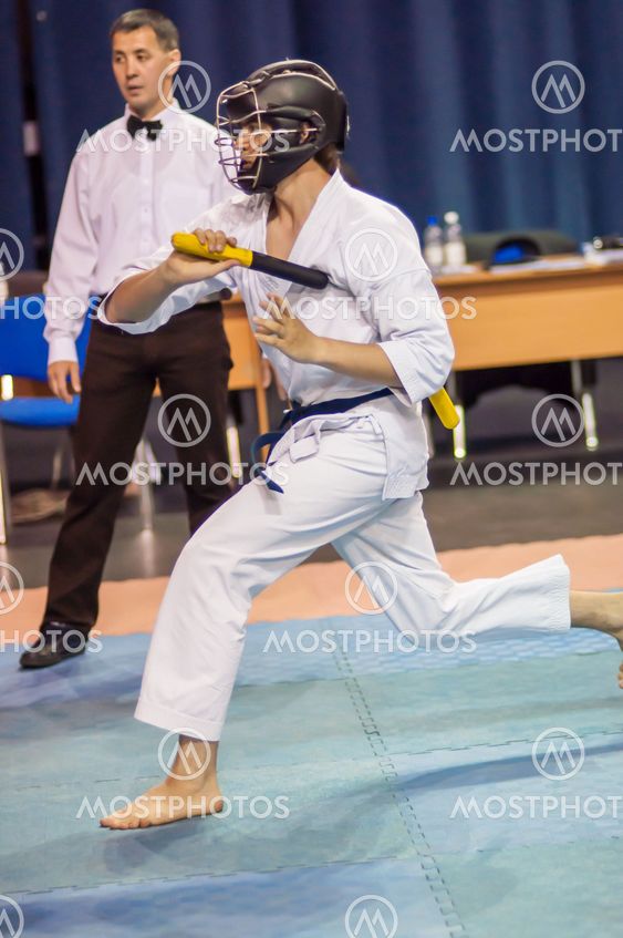 Kobudo competition men with nunchaku