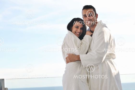 couple relaxing on balcony