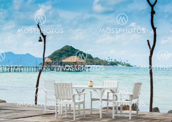 White dining table on the beach