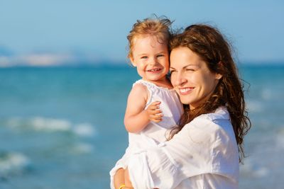 Mother and daughter on the beach