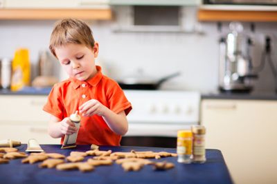 Boy baking cookies