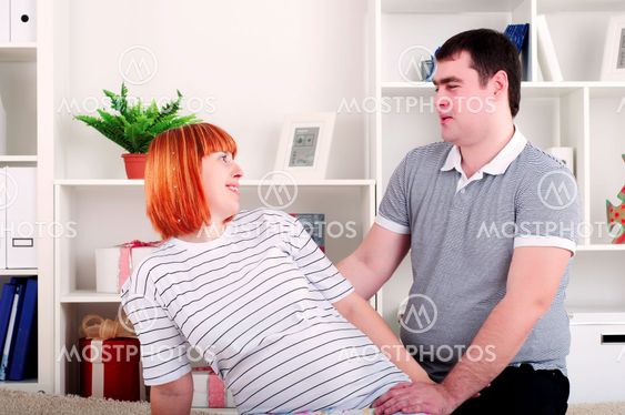 portrait of a husband and a pregnant wife