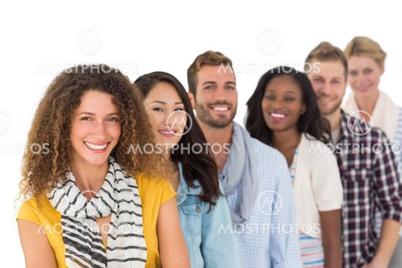 Happy group of young friends standing in a row