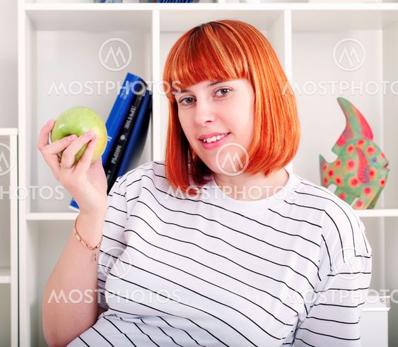 portrait of woman with apple