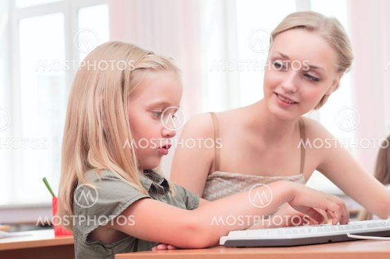 teacher explains the task schoolgirl