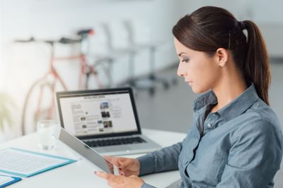Business woman using a digital tablet