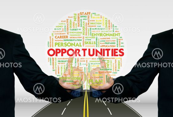 Man pushing the business word cloud on transparent screen