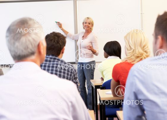 Senior tutor teaching class