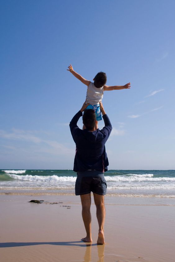 Father and son at the beach