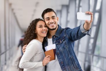 Time For Journey. Cheerful Middle-Eastern Couple Taking...