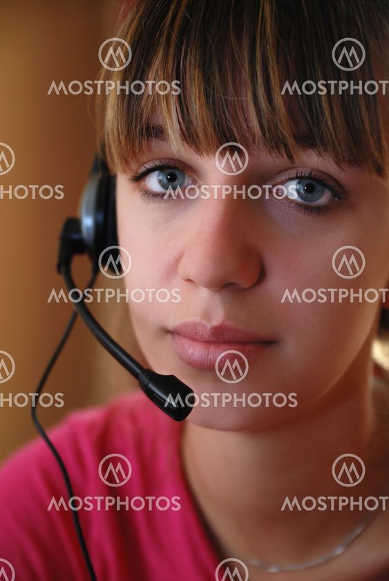 Smart young woman using head-set
