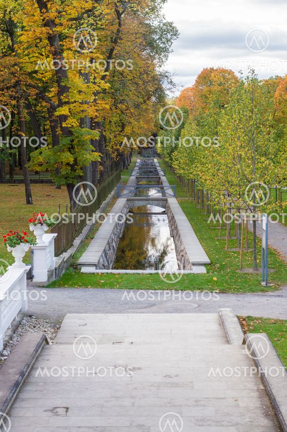 Picturesque water canal in autumn time Kadriorg park, Tallinn, Estonia