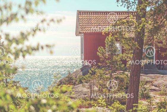 The writing Albert Engstrom writing cabin at the shore of...