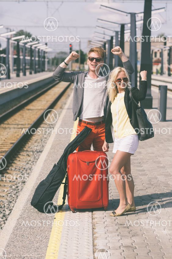 Young Couple Waiting at Train Station