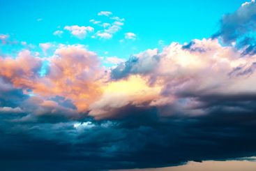 the sky after the sun has set is ablaze with brilliant...