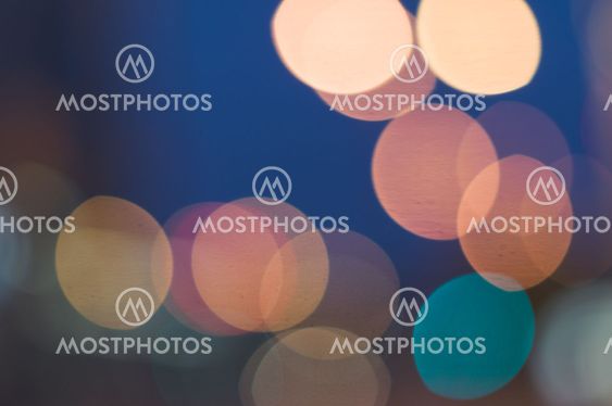 Abstract background of colorful blurred lights with bokeh effect