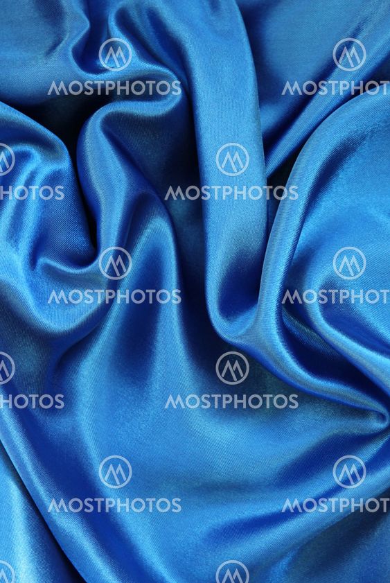 Smooth elegant blue silk as background