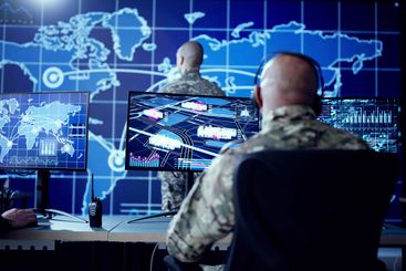 Cyber Technology Operator Monitoring Surveillance Cameras