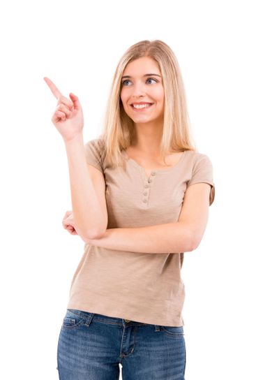 Beautiful woman smiling and pointing