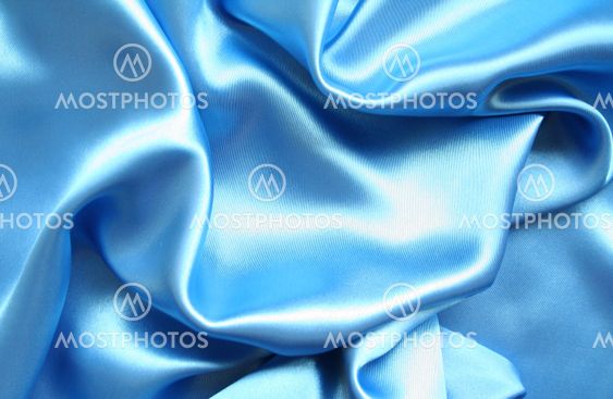 Smooth elegant blue silk as background